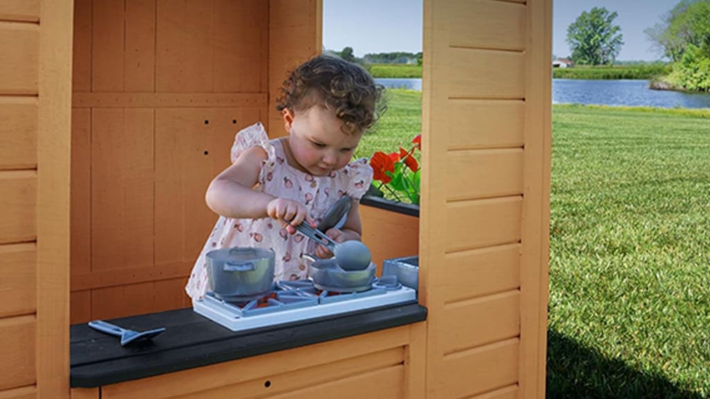 Backyard Discovery Caraway Cottage Cedar Wood Kids Outdoor Playhouse Playset with Play Kitchen